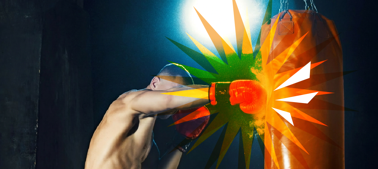 Boxer smashing an orange punching bag, emphasis added with splat star gaphics
